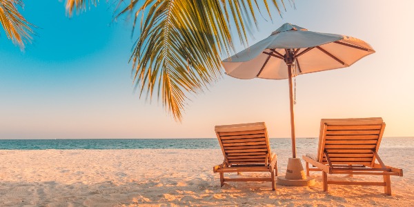 Beautiful tropical beach banner. White sand and coco palms travel tourism wide panorama background concept. Amazing beach landscape